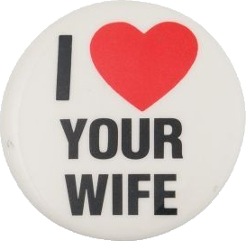 Alt text: A white button reading 'I heart your wife' in all caps. The heart is a drawing of a red cartoon heart.